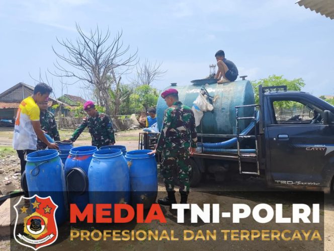 
 Satuan Tugas Marinir Pengamanan Pulau Terluar Laksanakan Bakti Sosial